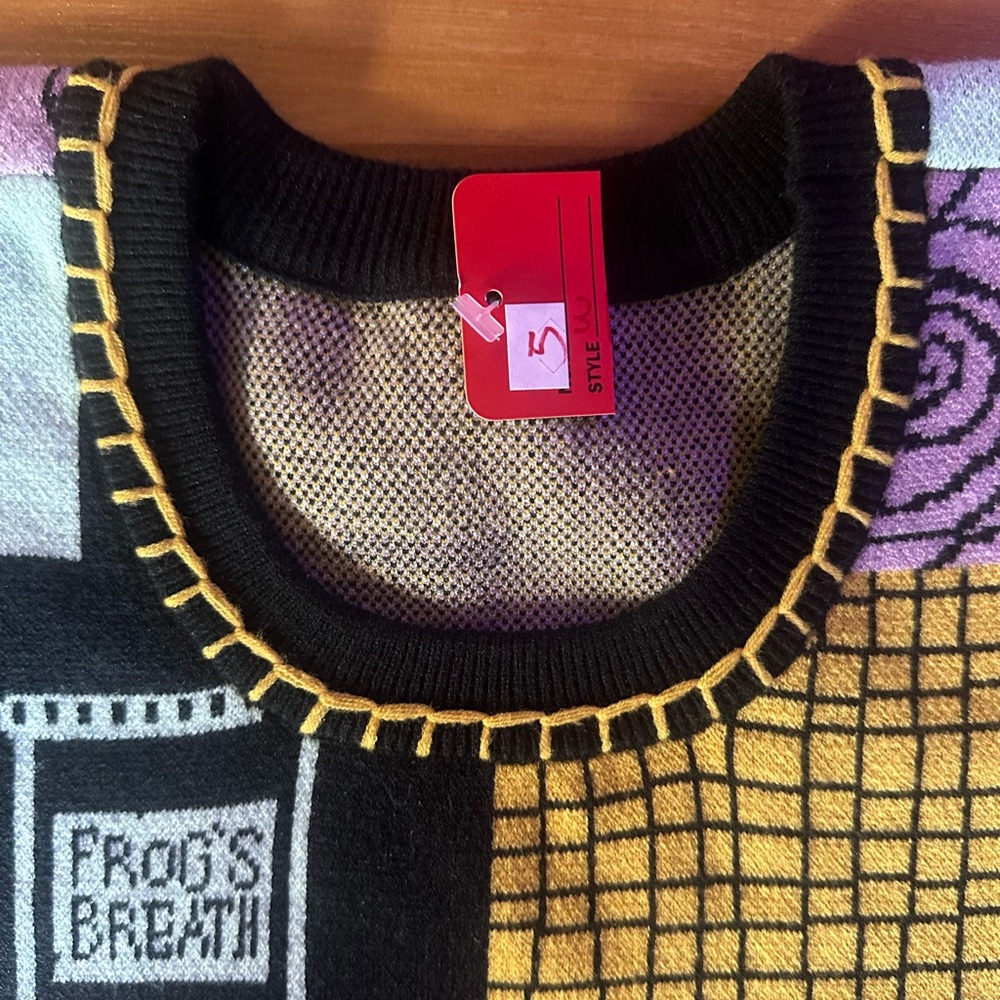 The Nightmare Before Christmas
Sally Patchwork Sweater - Picture 7 of 9